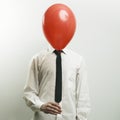 Portrait of office manager with head - balloon