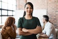 Portrait, office meeting and business woman with arms crossed in company workplace. Face, confidence and happy female Royalty Free Stock Photo