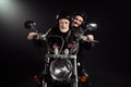 Portrait of old cool man drive chopper motor bike ride his wife enjoy free dome extreme lifestyle adventure wear vintage Royalty Free Stock Photo