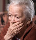 Portrait of old gray-haired sad woman Royalty Free Stock Photo