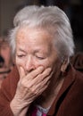 Portrait of old gray-haired sad woman Royalty Free Stock Photo