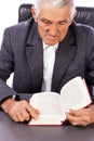 Portrait of an old man reading a book Royalty Free Stock Photo