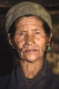 Portrait of a old nepalese woman in national clothes in her house