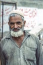 portrait of old pakistani man with white beard