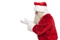 Portrait of old santa claus offering something to side Royalty Free Stock Photo