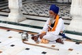 Portrait of an Old Sikh sitting at Golden Temple Harmandir Sahib. Royalty Free Stock Photo