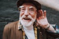 Portrait of old stylish hearing impaired man Royalty Free Stock Photo