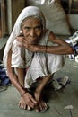 Portrait of old woman in traditional dress