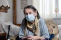 Portrait of old woman wearing surgical mask