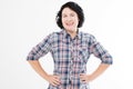 Portrait of older woman smiling with arms crossed isolated on white background