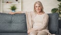 Portrait of senior woman smiling at home