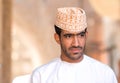 Portrait of an Omani man in a traditional Omani dress. Nizwa, Oman - 15/OCT/2016 Royalty Free Stock Photo