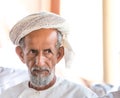 Portrait of an Omani man in a traditional Omani dress. Nizwa, Oman - 15/OCT/2016 Royalty Free Stock Photo