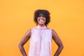 Portrait of one beautiful afro woman smiling and looking at the camera - happy cheerful american or african lady girl having fun Royalty Free Stock Photo