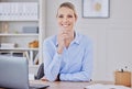 Portrait of one beautiful young caucasian businesswoman working on her laptop in the office at work. Confident and Royalty Free Stock Photo