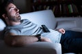 Portrait of one caucasian man watching tv Royalty Free Stock Photo