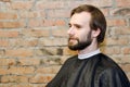 Portrait one freak bearded shaggy man long hair before haircut in barbershop