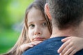 Portrait of one sad daughter hugging her father Royalty Free Stock Photo