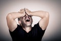 Portrait one sad man standing near a wall Royalty Free Stock Photo