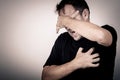 Portrait one sad man standing near a wall Royalty Free Stock Photo