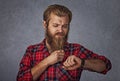 Portrait of one shocked man looking on wrist watch isolated grey gray background Royalty Free Stock Photo