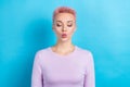 Portrait of optimistic nice cute girl with shirt haircut dressed pink shirt send air kiss to you isolated on blue color Royalty Free Stock Photo