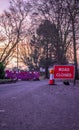 Portrait orientation view of a Road Closed sign with bollard and amber warning light