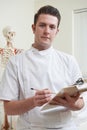 Portrait Of Osteopath In Consulting Room Royalty Free Stock Photo