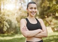 Portrait, outdoor and woman with fitness, arms crossed and smile with wellness, energy and workout. Face, person and