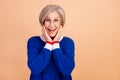 Portrait of overjoyed crazy senior woman wear blue jumper in eyewear staring at impressive discount isolated on pastel Royalty Free Stock Photo