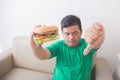 Overweight man stop eating junk food Royalty Free Stock Photo