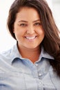 Portrait Of Overweight Woman Sitting On Sofa Royalty Free Stock Photo