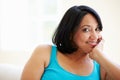 Portrait Of Overweight Woman Sitting On Sofa Royalty Free Stock Photo