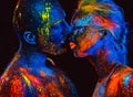 Portrait of a pair of lovers painted in fluorescent powder