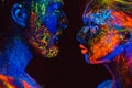 Portrait of a pair of lovers painted in fluorescent powder