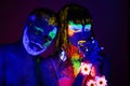 Portrait of a pair of lovers painted in fluorescent powder