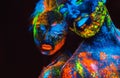 Portrait of a pair of lovers painted in fluorescent powder