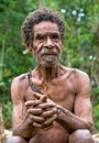 Portrait of a papuan oldman from a korowai tribe