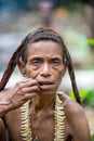 Portrait of a papuan woman from a korowai tribe.