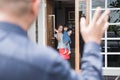 Kid waving goodbye to parent Royalty Free Stock Photo