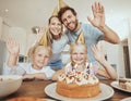 Portrait of parents, children and wave with birthday cake for celebration with video call, love and candles in home Royalty Free Stock Photo