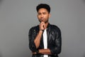 Portrait of a pensive afro american man in leather jacket