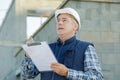 Portrait pensive man with clipboard Royalty Free Stock Photo