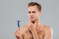 Portrait of a pensive man before shaving Royalty Free Stock Photo