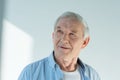 Portrait of pensive senior man in stylish shirt Royalty Free Stock Photo