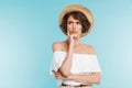 Portrait of a pensive young woman in summer hat Royalty Free Stock Photo