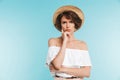 Portrait of a pensive young woman in summer hat Royalty Free Stock Photo