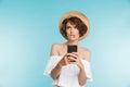 Portrait of a pensive young woman in summer hat Royalty Free Stock Photo