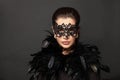 Portrait of perfect woman in carnival mask. Holiday fashion model portrait. Beauty hairstyle and makeup.