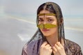 Portrait of Persian girl in traditional Muslim mask southern Ira